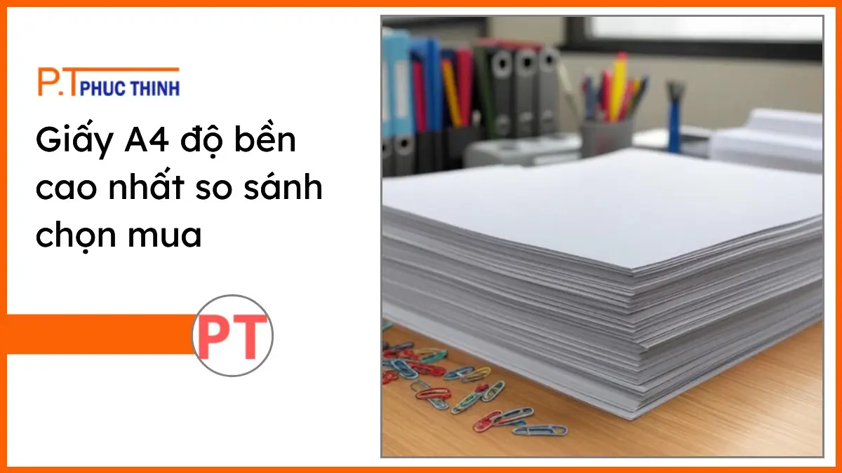 Chồng giấy A4 độ bền cao PT Phúc Thịnh trên bàn làm việc gọn gàng với văn phòng phẩm đa dạng, thể hiện chất lượng giấy.